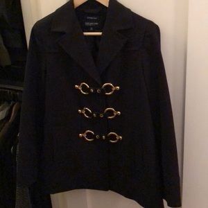 Black jacket with gold buckle pea coat